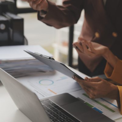 Team of business people working together in the meeting room office, teamwork background charts and graphs banner, double exposure successful teamwork,business planning concept.